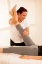 Physiotherapy -therapist exercising with patient , working on le Royalty Free Stock Photo