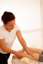 Physiotherapy -therapist exercising with patient , working on le Royalty Free Stock Photo