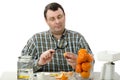 Phytocontrol engineer stares at the mandarine Royalty Free Stock Photo