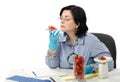 Phytosanitary expert smelling strawberries