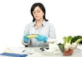 Phytosanitary technician measuring the lenght of zucchini