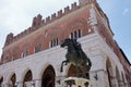 Piacenza, Italy - june 2020: central square with particular equestrian statues on the sides of the Governor palace.