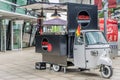 Piaggio Ape Classic 400 platform truck, converted into a rolling sales stand for streetfood with curry sausage, hamburgers, French