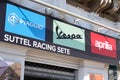 Piaggio vespa and aprilia dealership sign text and brand logo of italian motorcycle and