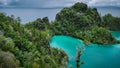 Pianemo Islands, Blue Lagoon with Green Rocks, Raja Ampat, West Papua. Indonesia Royalty Free Stock Photo