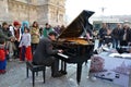 Pianist Paolo Zanarella gives free music street show playing his grand piano at the Duomo of Milan. Royalty Free Stock Photo