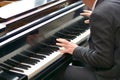 The pianist plays a sweet melody