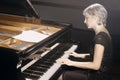 Pianist woman playing piano concert Royalty Free Stock Photo