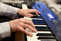 Pianists hands and piano keyboard Royalty Free Stock Photo