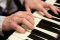 Pianists hands and piano keyboard Royalty Free Stock Photo