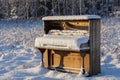 Piano Abandoned in Winter Field Royalty Free Stock Photo