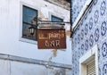 Piano Bar vintage rusty sign in Aveiro, Portugal. Patterned tiles wall in north Portugal, the Venice of Europe, with bar sign Royalty Free Stock Photo