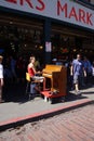 Piano busker entertains visitors
