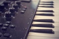 Piano or electone midi keyboard, electronic musical synthesizer white and black key. Vintage effect, instagram filter