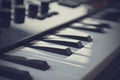 Piano or electone midi keyboard, electronic musical synthesizer white and black key. Vintage effect, instagram filter
