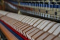 Piano inside the strings wooden hammers and other musical details, waiting for the master tuner piano