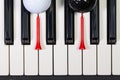 Piano keyboard and different golf balls and tees Royalty Free Stock Photo