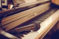 Piano keyboard and microphone, close-up, macro. The concept of creativity and hobbies. Royalty Free Stock Photo