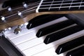 Piano keys and guitar strings Royalty Free Stock Photo