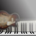 Piano keys and reflection with jazz guitar Royalty Free Stock Photo