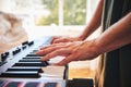 Piano, man and hands on keys for music, creative talent and skills in home studio. Closeup, musician and playing