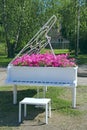 Piano with notes and petunia blossoming within. Keyboard musical instrument Royalty Free Stock Photo