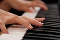 Piano player closeup on hands Royalty Free Stock Photo