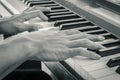 Piano Player Hand on Electric Piano in Crosswise View and Vintage Tone