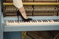 Piano and legs, musical style, grunge instrument. Royalty Free Stock Photo