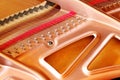 Strings and soundboard in a grand piano. Royalty Free Stock Photo