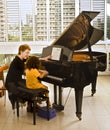 The piano teacher Royalty Free Stock Photo