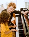 The piano teacher Royalty Free Stock Photo