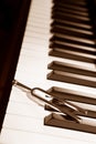 Piano and tuning forl Royalty Free Stock Photo