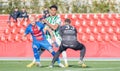 Piast Gliwice centre-back Jakub Czerwinski and goalkeeper Karol Szymanski against Ferencvaros striker Ryan Mmaee during club Royalty Free Stock Photo