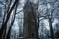 Medieval chapel and tower in winter scenery in Poland
