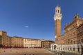 Piazza del Campo with Palazzo Pubblico and Torre del Mangia in Siena, Italy