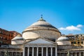 Piazza del Plabiscito crowded of tourists. Square named after the plebiscite taken on October 21, 1860, that brought Naples into