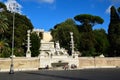 Piazza del Popolo with the Fontana della Dea di Roma, looking up at the Baclonata del Pincio in Rome, Italy Royalty Free Stock Photo