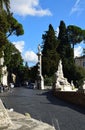 Piazza del Popolo with the Fontana della Dea di Roma, looking up at the Baclonata del Pincio in Rome, Italy Royalty Free Stock Photo
