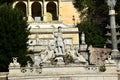 Piazza del Popolo with the Fontana della Dea di Roma, looking up at the Baclonata del Pincio in Rome, Italy Royalty Free Stock Photo