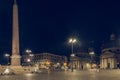 Piazza del Popolo twin churches at night with obelisk and fountain in street lighting Royalty Free Stock Photo