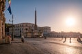 Piazza del Quirinale with obelisk and tourists