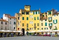 Piazza dell Anfiteatro square in circus yard of medieval town Lucca