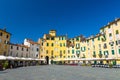 Piazza dell Anfiteatro square in circus yard of medieval town Lucca historical centre