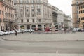 rome, italy - dec 2, 2015: piazza di barberini wide shot of fountain in roundabout traffic circle rotary 91 p