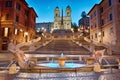Piazza di Spagna, the Spanish Steps and the Fontana della Barcaccia in Rome in the night highlighting Royalty Free Stock Photo