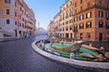 Piazza di Spagna square and Fontana della Barcaccia fountain in Rome morning view Royalty Free Stock Photo