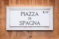 Piazza di Spagna street sign on wall in Rome, Italy Royalty Free Stock Photo