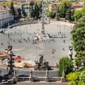 Piazza Popolo with famous Flaminio obelisk in the middle and Rome cityscape at the background