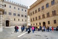 Piazza Salimbeni is square with Statue of Sallustio Bandini in old town Siena. Tuscany, Italy Royalty Free Stock Photo